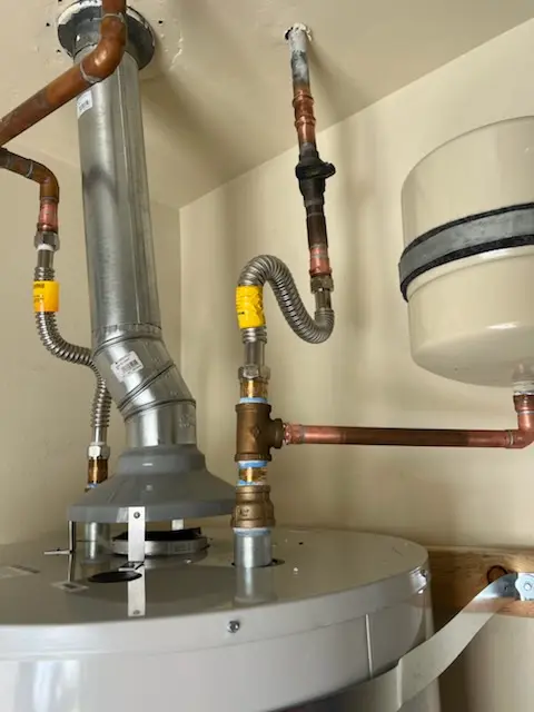 Water heater installation and plumbing repair in Rosser
